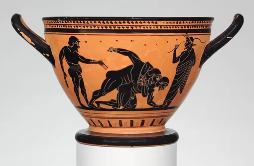 Соревнования борцов-олимпийцев, изображенные на греческой вазе (около 500 г. до нашей эры). В программу Олимпийских игр греко-римская борьба вошла в 1896 году, вольная борьба — в 1904-м. Женская вольная борьба была введена на летней Олимпиаде 2004 года в Афинах.