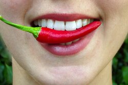 Опасно ли для здоровья есть много перца чили?