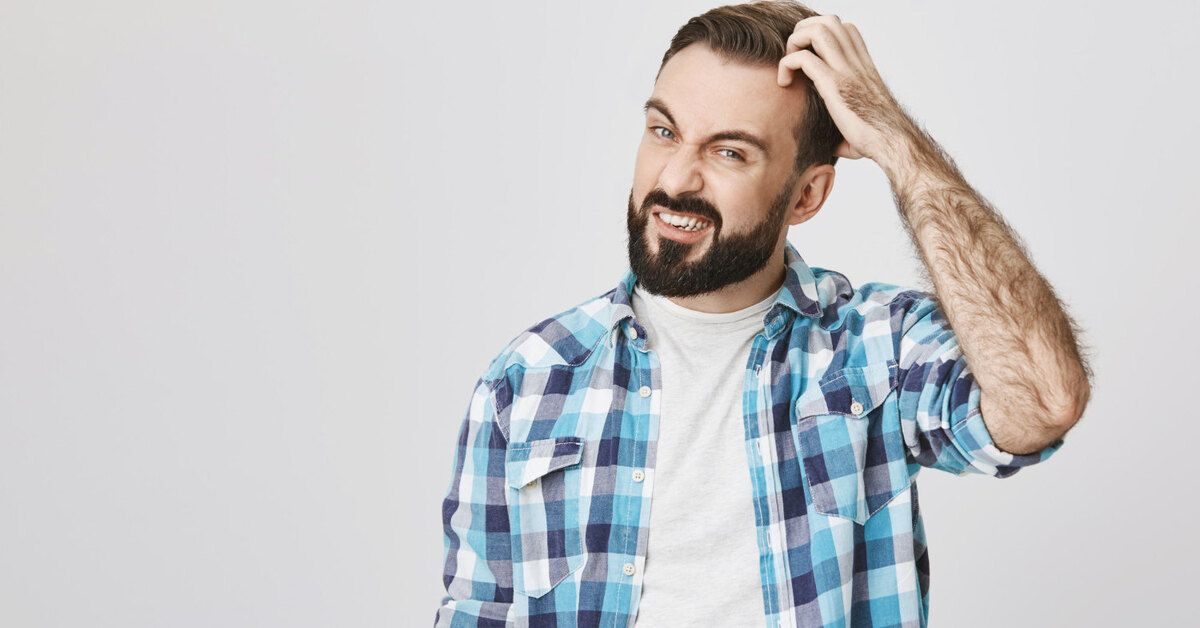 Почему появляется перхоть в волосах?